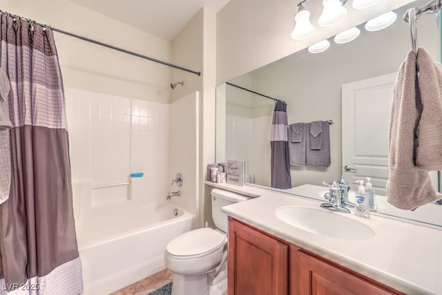 full bathroom with shower / tub combo with curtain, vanity, toilet, and tile patterned flooring