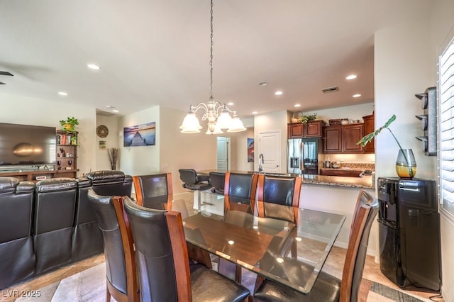 dining area with a chandelier