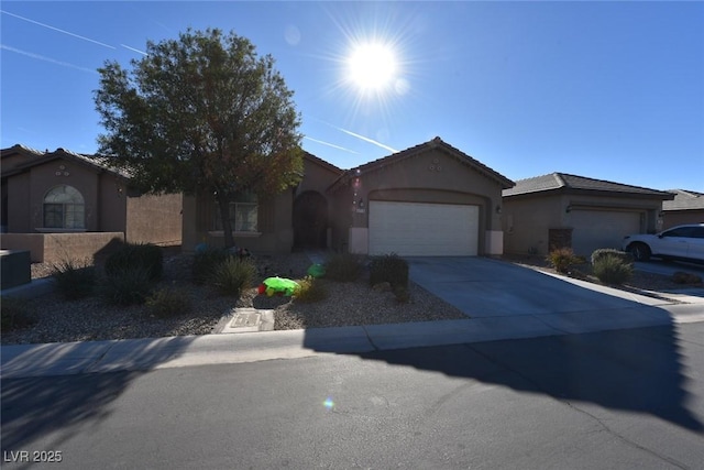 ranch-style home featuring a garage