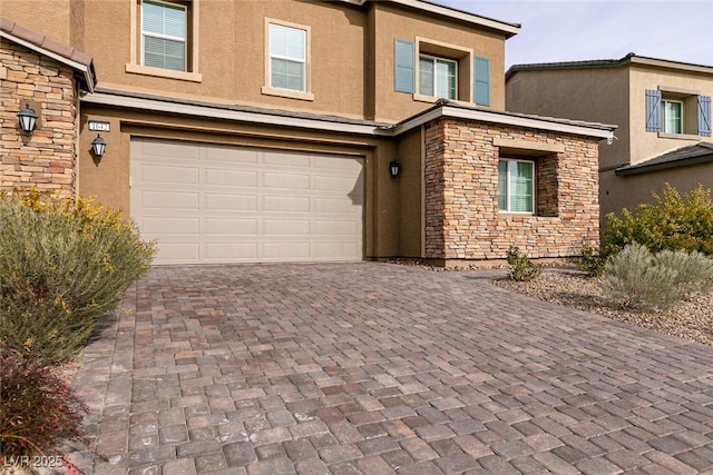 view of front of property with a garage