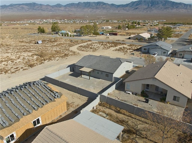 drone / aerial view featuring a mountain view