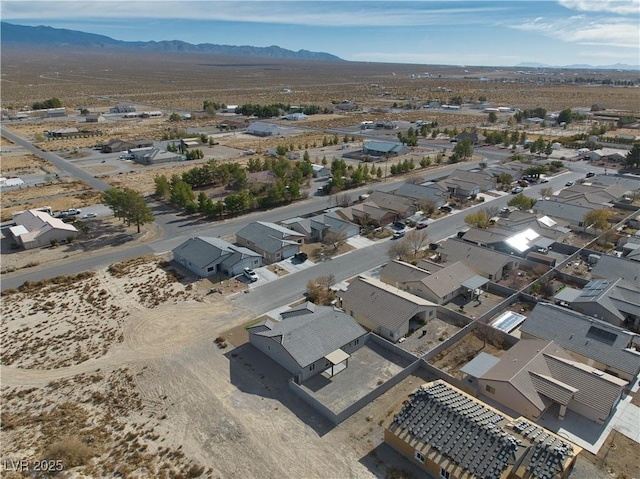 drone / aerial view featuring a mountain view