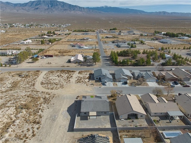 drone / aerial view featuring a mountain view