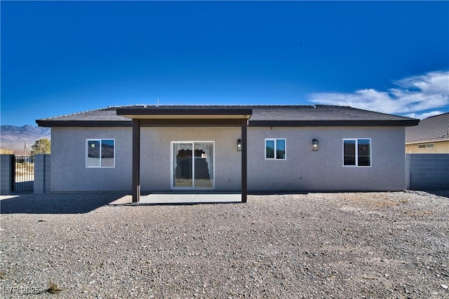 rear view of house featuring a patio area