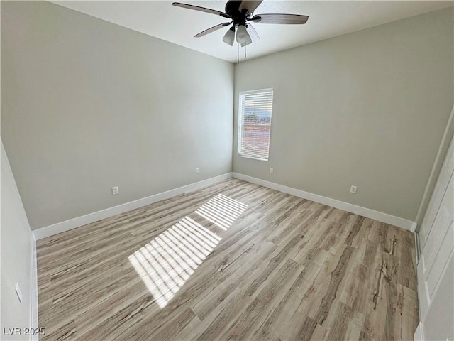 unfurnished room featuring light hardwood / wood-style flooring and ceiling fan