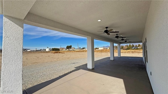 view of patio / terrace featuring ceiling fan