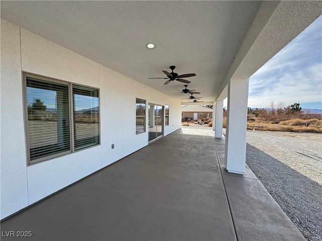 view of patio / terrace featuring ceiling fan