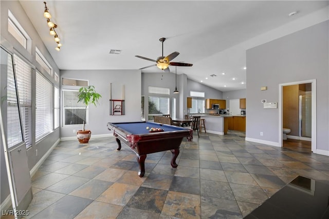 game room with vaulted ceiling, ceiling fan, and billiards