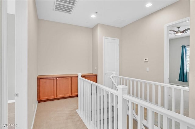 10375 Pescado Ln, Las Vegas, NV 89135 - hallway featuring an upstairs landing, light colored carpet, recessed lighting, and baseboards