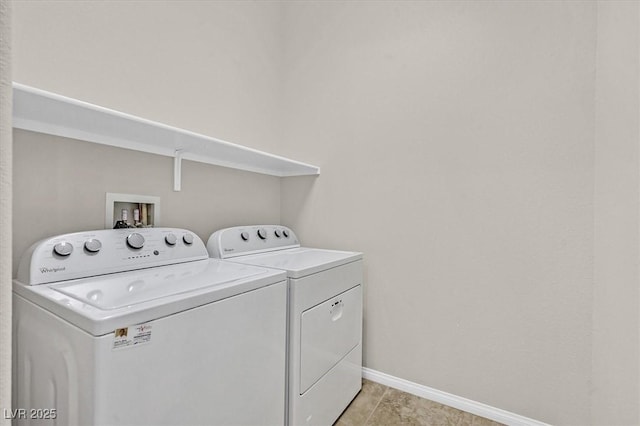 laundry room with washing machine and dryer