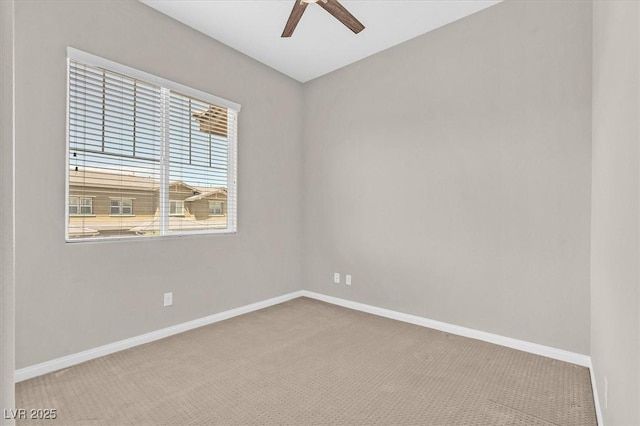 unfurnished room featuring carpet flooring and ceiling fan