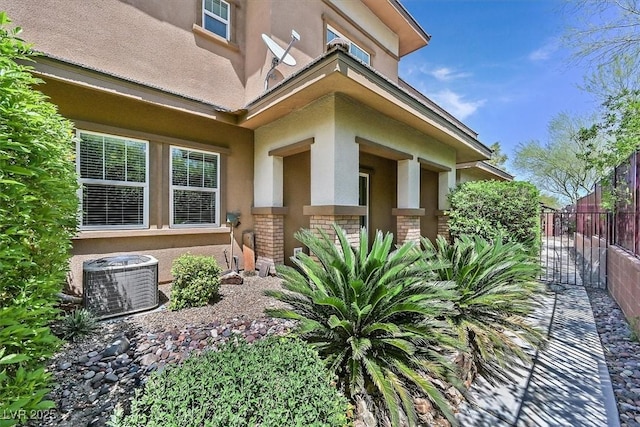 10375 Pescado Ln, Las Vegas, NV 89135 - property entrance with central AC and stucco siding