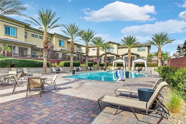 view of pool with a gazebo and a patio