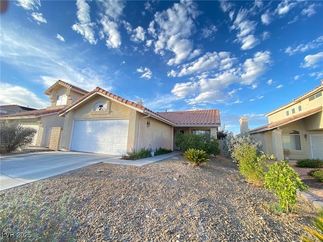 view of front of property featuring a garage