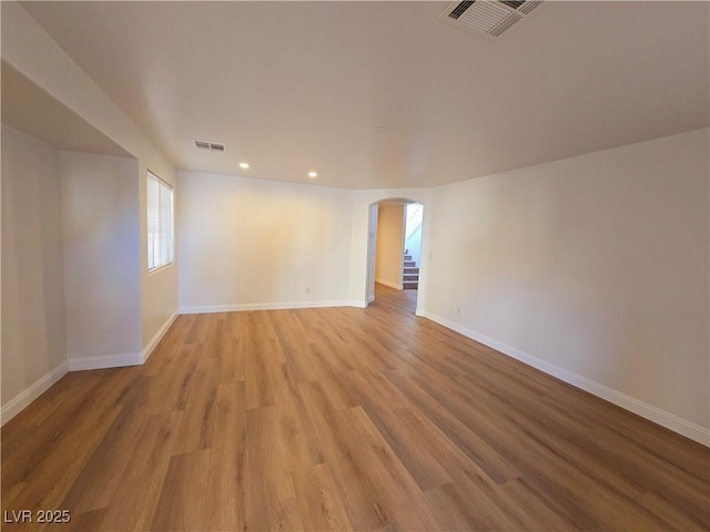 unfurnished room featuring light hardwood / wood-style flooring