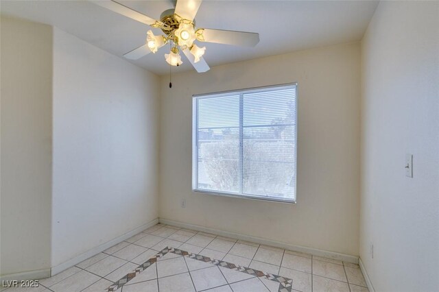 unfurnished room featuring light tile patterned floors, plenty of natural light, and ceiling fan