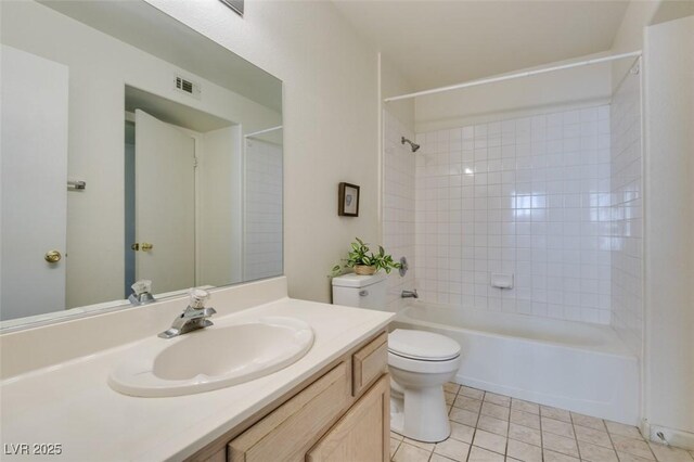 full bathroom featuring tile patterned flooring, shower / tub combination, vanity, and toilet