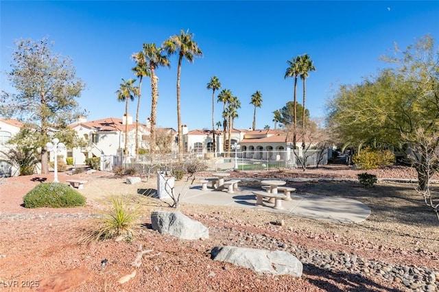 view of yard featuring a residential view and fence