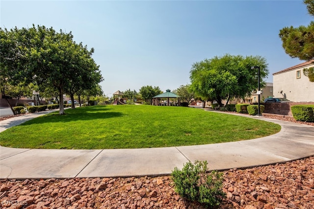 view of home's community featuring a gazebo and a yard