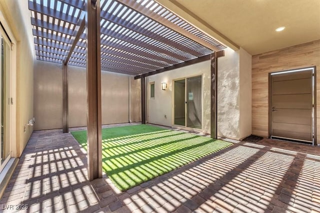 view of patio featuring a pergola