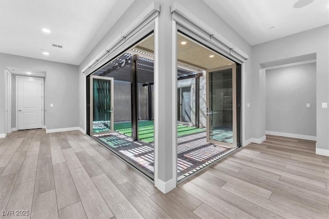 empty room featuring light hardwood / wood-style floors