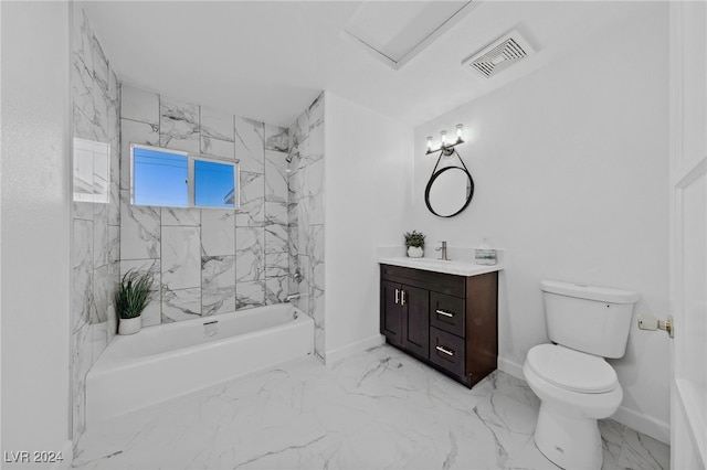 full bathroom featuring vanity, tiled shower / bath combo, and toilet