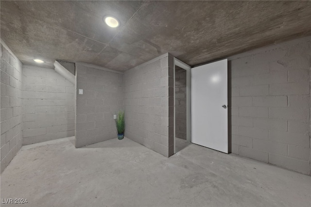 bathroom with concrete flooring