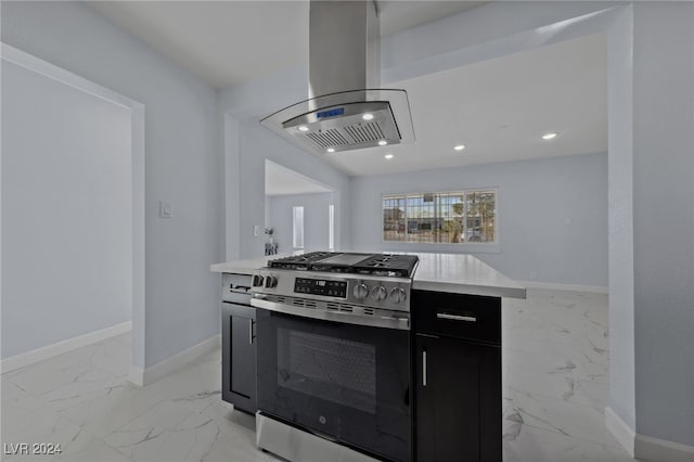 kitchen featuring island range hood and stainless steel range with gas stovetop