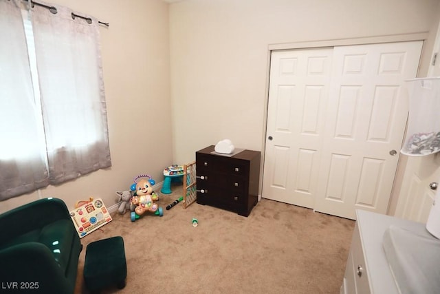 playroom with light colored carpet