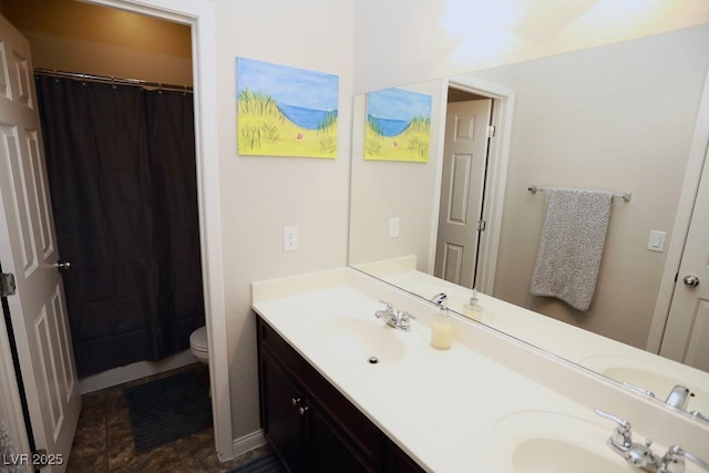 bathroom featuring a shower with curtain, vanity, and toilet