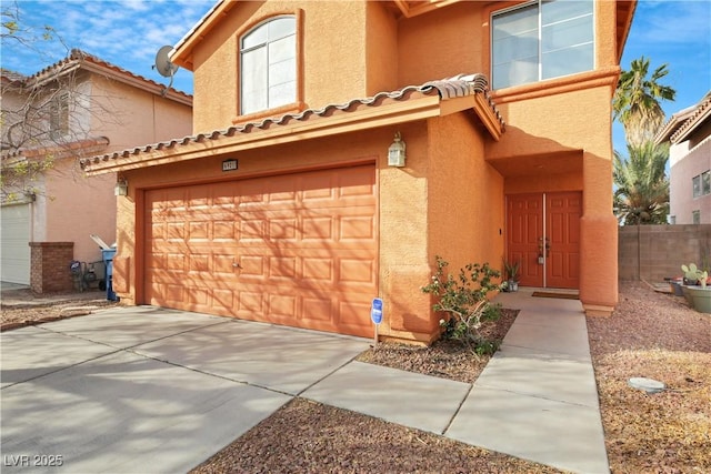 view of front of property with a garage