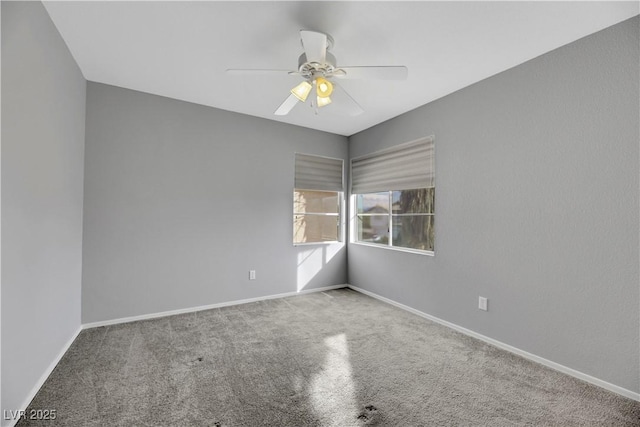 unfurnished room featuring carpet and ceiling fan