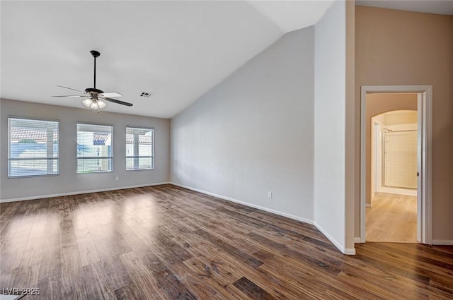 interior space with ceiling fan, vaulted ceiling, and hardwood / wood-style flooring