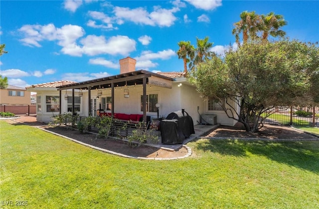 rear view of property with outdoor lounge area, a patio area, and a yard