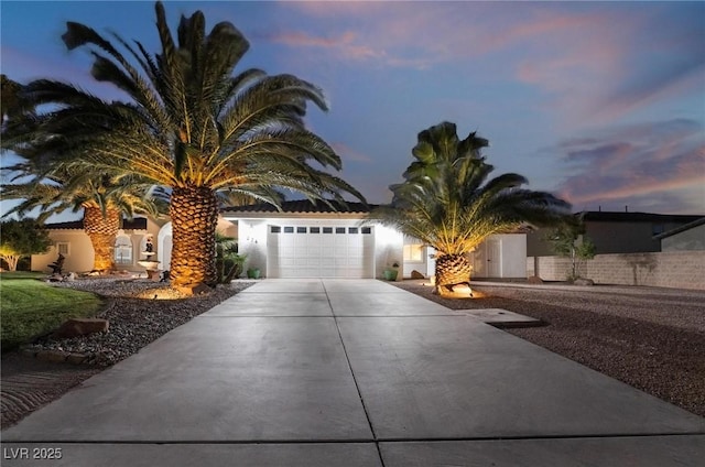 view of front of property with a garage