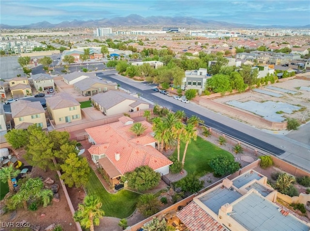 drone / aerial view featuring a mountain view