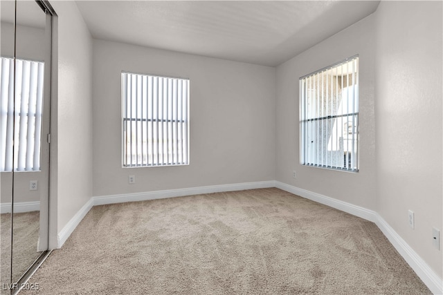 view of carpeted spare room