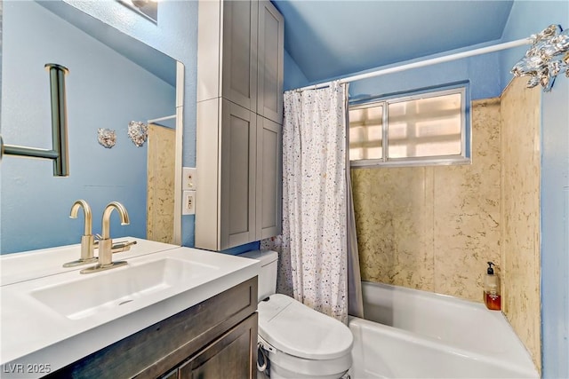 full bathroom with vanity, shower / tub combo, and toilet