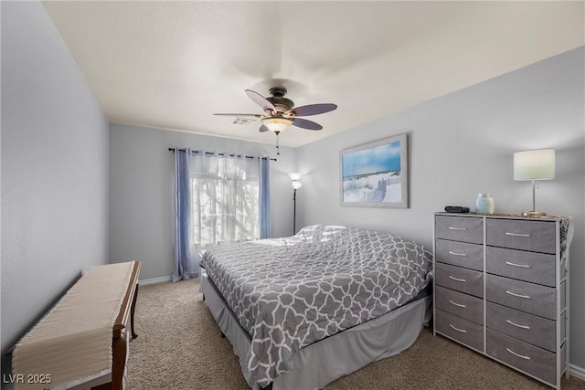 bedroom with ceiling fan and carpet flooring