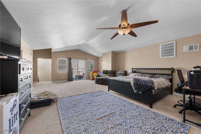 bedroom with vaulted ceiling, ceiling fan, and light carpet