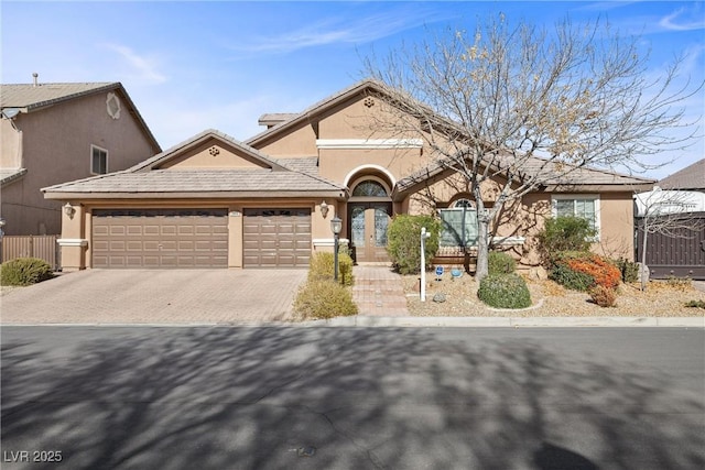 single story home featuring a garage