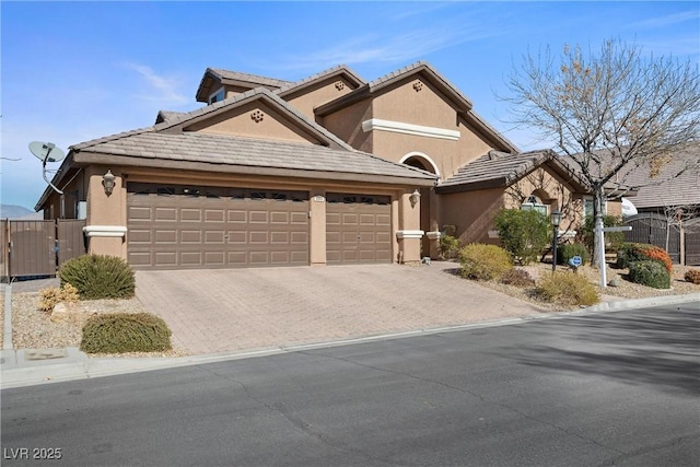 view of front of home with a garage