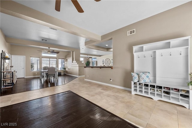 interior space with ceiling fan and hardwood / wood-style floors