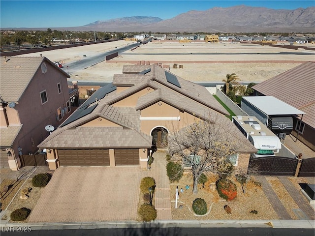 drone / aerial view featuring a mountain view