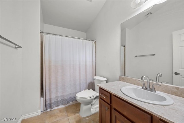 full bathroom featuring tile patterned floors, vanity, toilet, and shower / tub combo with curtain