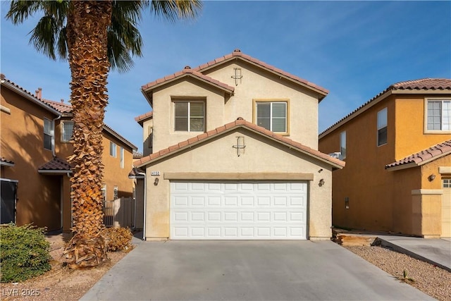 mediterranean / spanish-style home featuring a garage