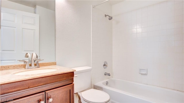 full bath featuring toilet, tub / shower combination, and vanity