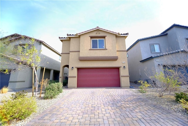 view of front of property featuring a garage