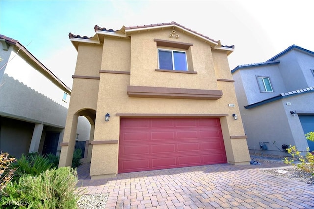 view of front of house with a garage