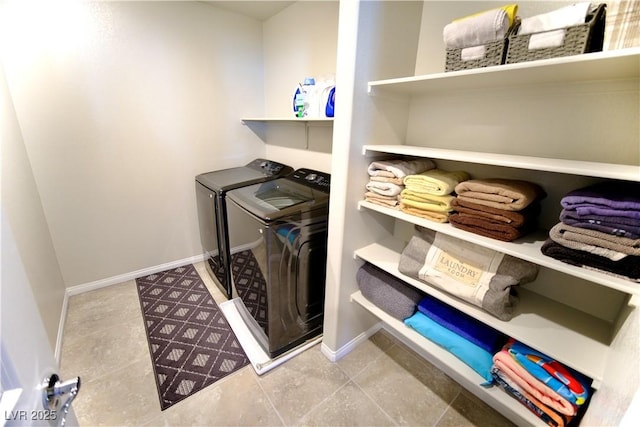 laundry area with separate washer and dryer